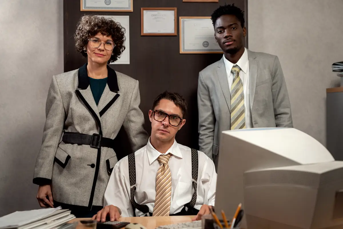 Vintage style office workers having a desk job